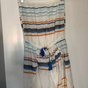 Striped romper with elastic waist and top.